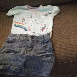 A unicorn top and jean skirt